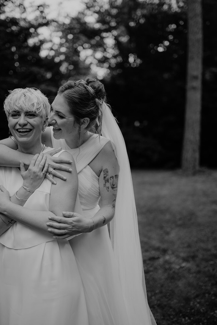 international wedding couple hugging each other