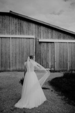 German bride looks at her wedding dress